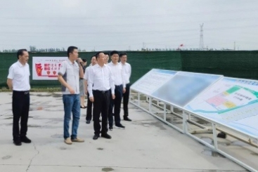 武汉市委副书记、代市长顾坤到尊龙集团武汉公司调研